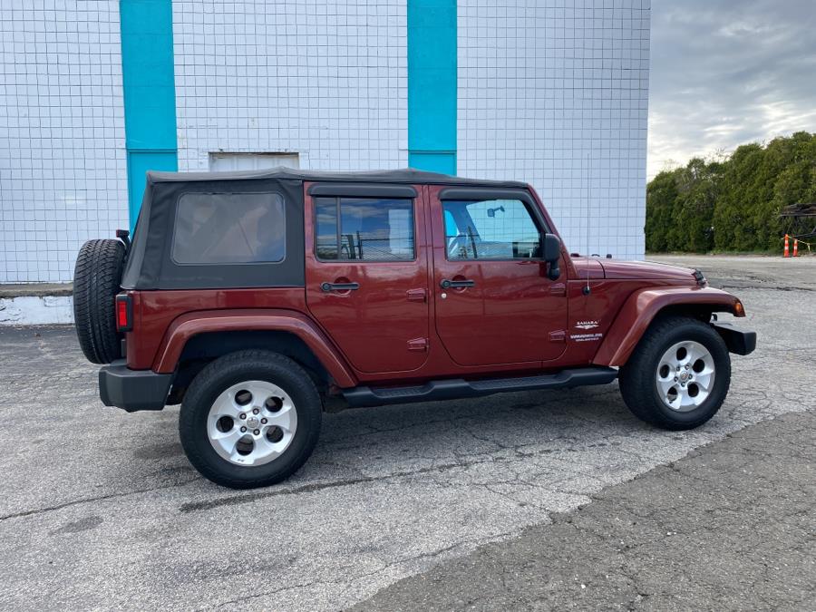 2010 Jeep Wrangler Unlimited 4WD 4dr Sahara, available for sale in Milford, Connecticut | Dealertown Auto Wholesalers. Milford, Connecticut 2010 Jeep Wrangler Unlimited 4WD 4dr Sahara, available for sale in Milford, Connecticut | Dealertown Auto Wholesalers. Milford, Connecticut