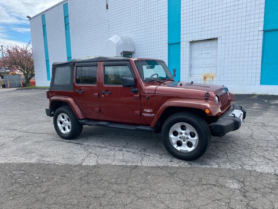 2010 Jeep Wrangler Unlimited 4WD 4dr Sahara, available for sale in Milford, Connecticut | Dealertown Auto Wholesalers. Milford, Connecticut 2010 Jeep Wrangler Unlimited 4WD 4dr Sahara, available for sale in Milford, Connecticut | Dealertown Auto Wholesalers. Milford, Connecticut