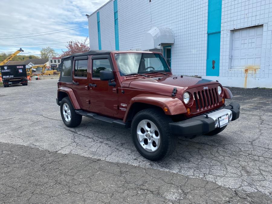 2010 Jeep Wrangler Unlimited 4WD 4dr Sahara, available for sale in Milford, Connecticut | Dealertown Auto Wholesalers. Milford, Connecticut 2010 Jeep Wrangler Unlimited 4WD 4dr Sahara, available for sale in Milford, Connecticut | Dealertown Auto Wholesalers. Milford, Connecticut