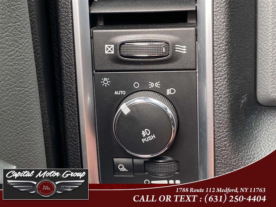 2016 Ram 1500 4WD Crew Cab 140.5" Outdoorsman, available for sale in Medford, New York | Capital Motor Group Inc. Medford, New York 2016 Ram 1500 4WD Crew Cab 140.5" Outdoorsman, available for sale in Medford, New York | Capital Motor Group Inc. Medford, New York