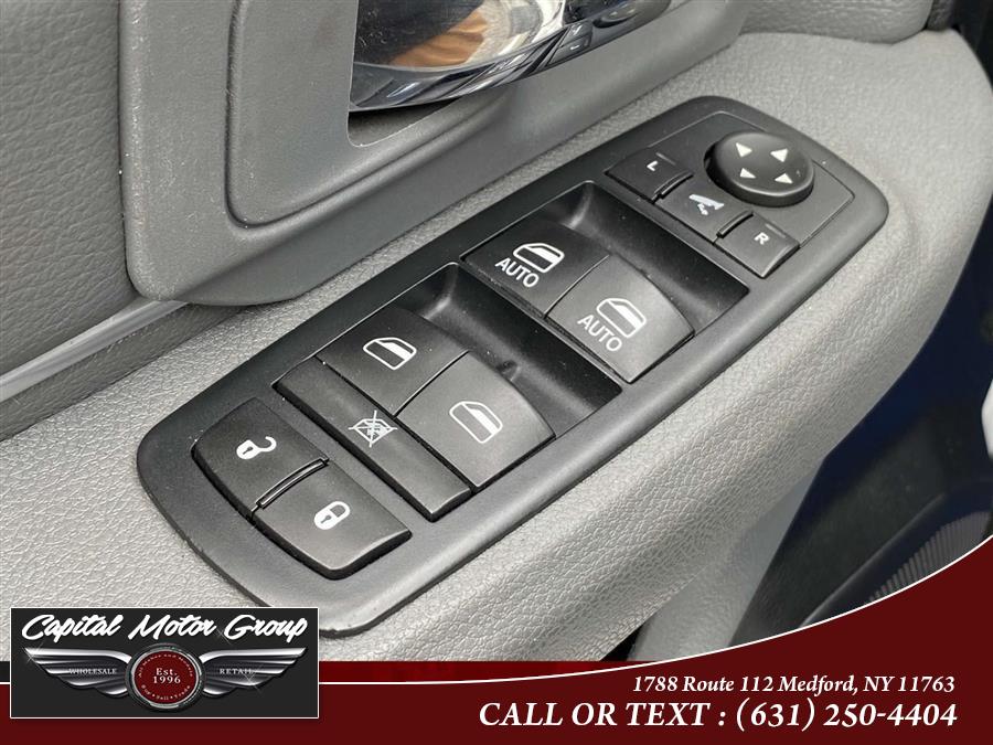 2016 Ram 1500 4WD Crew Cab 140.5" Outdoorsman, available for sale in Medford, New York | Capital Motor Group Inc. Medford, New York 2016 Ram 1500 4WD Crew Cab 140.5" Outdoorsman, available for sale in Medford, New York | Capital Motor Group Inc. Medford, New York