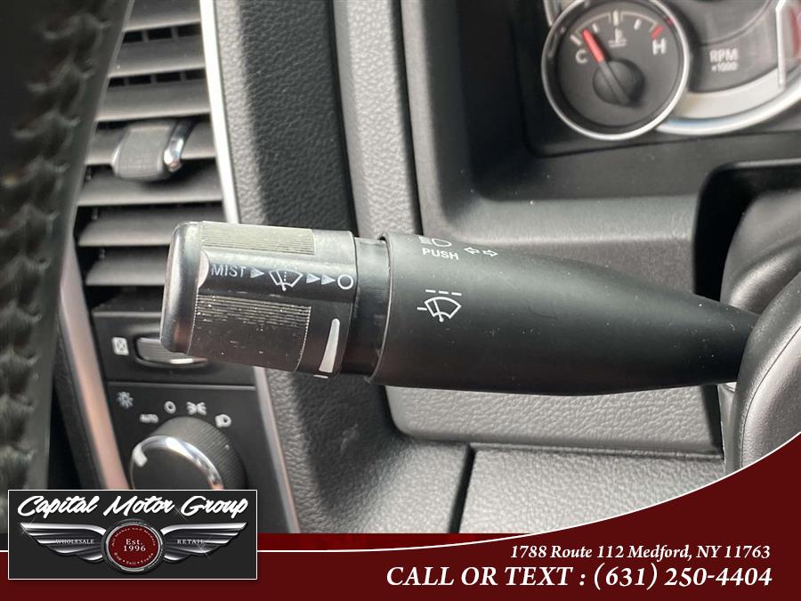 2016 Ram 1500 4WD Crew Cab 140.5" Outdoorsman, available for sale in Medford, New York | Capital Motor Group Inc. Medford, New York 2016 Ram 1500 4WD Crew Cab 140.5" Outdoorsman, available for sale in Medford, New York | Capital Motor Group Inc. Medford, New York