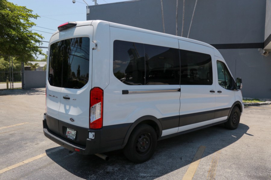 2021 Ford Transit Passenger Wagon T-350 148" Med Roof XLT RWD, available for sale in Miami, Florida | 26 Motors Miami. Miami, Florida 2021 Ford Transit Passenger Wagon T-350 148" Med Roof XLT RWD, available for sale in Miami, Florida | 26 Motors Miami. Miami, Florida