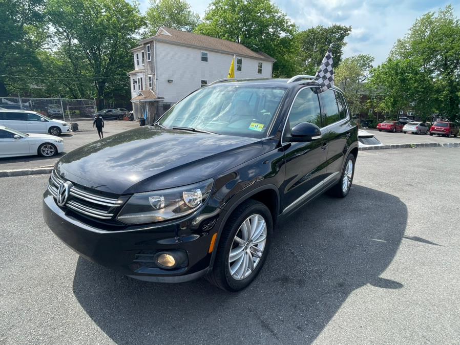 2013 Volkswagen Tiguan 4WD 4dr Auto SE w/Sunroof & Nav *Ltd Avail*, available for sale in Irvington, New Jersey | Elis Motors Corp. Irvington, New Jersey 2013 Volkswagen Tiguan 4WD 4dr Auto SE w/Sunroof & Nav *Ltd Avail*, available for sale in Irvington, New Jersey | Elis Motors Corp. Irvington, New Jersey