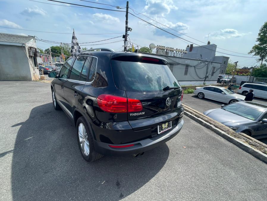 2013 Volkswagen Tiguan 4WD 4dr Auto SE w/Sunroof & Nav *Ltd Avail*, available for sale in Irvington, New Jersey | Elis Motors Corp. Irvington, New Jersey 2013 Volkswagen Tiguan 4WD 4dr Auto SE w/Sunroof & Nav *Ltd Avail*, available for sale in Irvington, New Jersey | Elis Motors Corp. Irvington, New Jersey