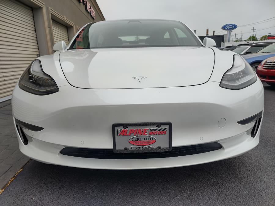 2020 Tesla Model 3 Standard Range Plus RWD, available for sale in Wantagh, New York | Alpine Motors Inc. Wantagh, New York 2020 Tesla Model 3 Standard Range Plus RWD, available for sale in Wantagh, New York | Alpine Motors Inc. Wantagh, New York