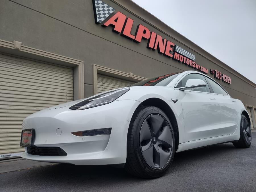 2020 Tesla Model 3 Standard Range Plus RWD, available for sale in Wantagh, New York | Alpine Motors Inc. Wantagh, New York 2020 Tesla Model 3 Standard Range Plus RWD, available for sale in Wantagh, New York | Alpine Motors Inc. Wantagh, New York