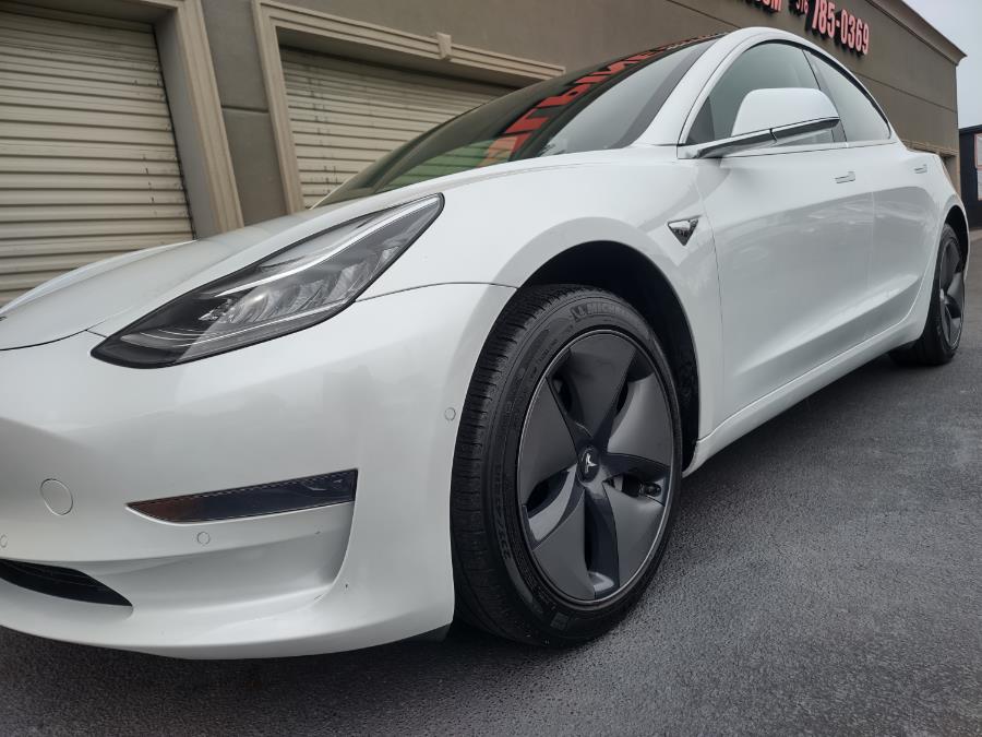 2020 Tesla Model 3 Standard Range Plus RWD, available for sale in Wantagh, New York | Alpine Motors Inc. Wantagh, New York 2020 Tesla Model 3 Standard Range Plus RWD, available for sale in Wantagh, New York | Alpine Motors Inc. Wantagh, New York