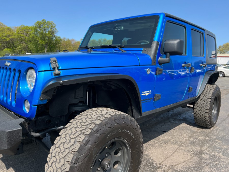 2015 Jeep Wrangler Unlimited 4WD 4dr Sahara, available for sale in Ortonville, Michigan | Marsh Auto Sales LLC. Ortonville, Michigan 2015 Jeep Wrangler Unlimited 4WD 4dr Sahara, available for sale in Ortonville, Michigan | Marsh Auto Sales LLC. Ortonville, Michigan