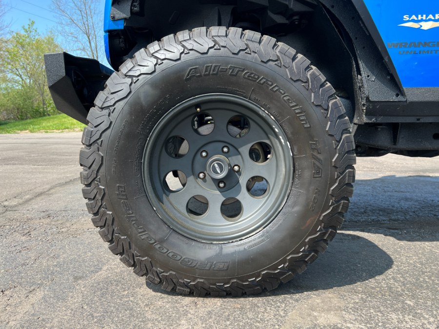 2015 Jeep Wrangler Unlimited 4WD 4dr Sahara, available for sale in Ortonville, Michigan | Marsh Auto Sales LLC. Ortonville, Michigan 2015 Jeep Wrangler Unlimited 4WD 4dr Sahara, available for sale in Ortonville, Michigan | Marsh Auto Sales LLC. Ortonville, Michigan