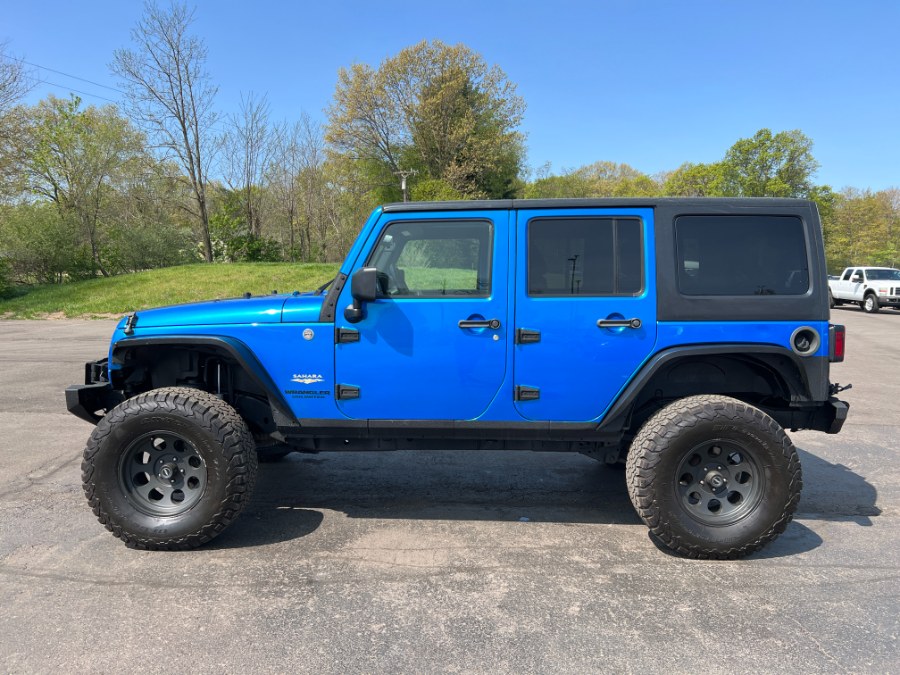 2015 Jeep Wrangler Unlimited 4WD 4dr Sahara, available for sale in Ortonville, Michigan | Marsh Auto Sales LLC. Ortonville, Michigan 2015 Jeep Wrangler Unlimited 4WD 4dr Sahara, available for sale in Ortonville, Michigan | Marsh Auto Sales LLC. Ortonville, Michigan