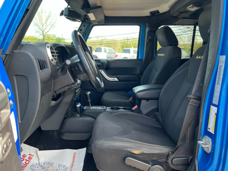 2015 Jeep Wrangler Unlimited 4WD 4dr Sahara, available for sale in Ortonville, Michigan | Marsh Auto Sales LLC. Ortonville, Michigan 2015 Jeep Wrangler Unlimited 4WD 4dr Sahara, available for sale in Ortonville, Michigan | Marsh Auto Sales LLC. Ortonville, Michigan