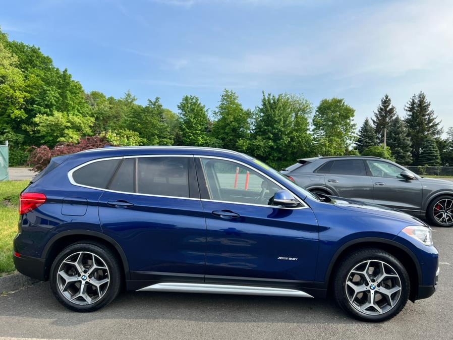 2018 BMW X1 xDrive28i Sports Activity Vehicle, available for sale in Berlin, Connecticut | Tru Auto Mall. Berlin, Connecticut 2018 BMW X1 xDrive28i Sports Activity Vehicle, available for sale in Berlin, Connecticut | Tru Auto Mall. Berlin, Connecticut