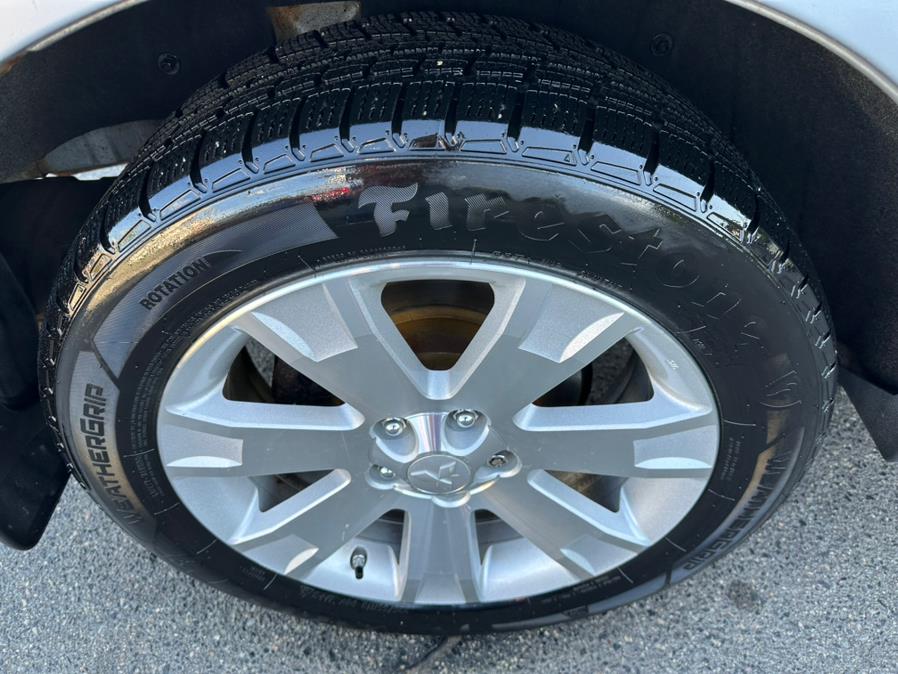 2011 Mitsubishi Outlander 4WD 4dr SE, available for sale in Taunton, Massachusetts | Rt 138 Auto Center Inc . Taunton, Massachusetts 2011 Mitsubishi Outlander 4WD 4dr SE, available for sale in Taunton, Massachusetts | Rt 138 Auto Center Inc . Taunton, Massachusetts