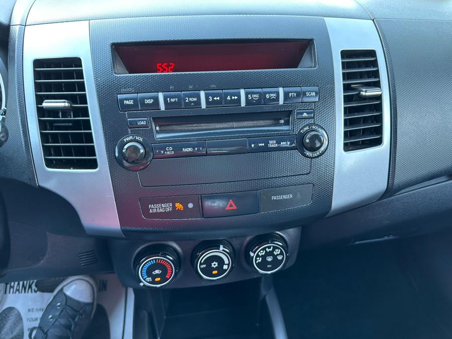 2011 Mitsubishi Outlander 4WD 4dr SE, available for sale in Taunton, Massachusetts | Rt 138 Auto Center Inc . Taunton, Massachusetts 2011 Mitsubishi Outlander 4WD 4dr SE, available for sale in Taunton, Massachusetts | Rt 138 Auto Center Inc . Taunton, Massachusetts