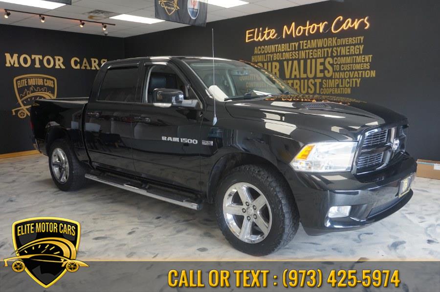 2012 Ram 1500 4WD Crew Cab 140.5" Sport, available for sale in Newark, New Jersey | Elite Motor Cars. Newark, New Jersey 2012 Ram 1500 4WD Crew Cab 140.5" Sport, available for sale in Newark, New Jersey | Elite Motor Cars. Newark, New Jersey