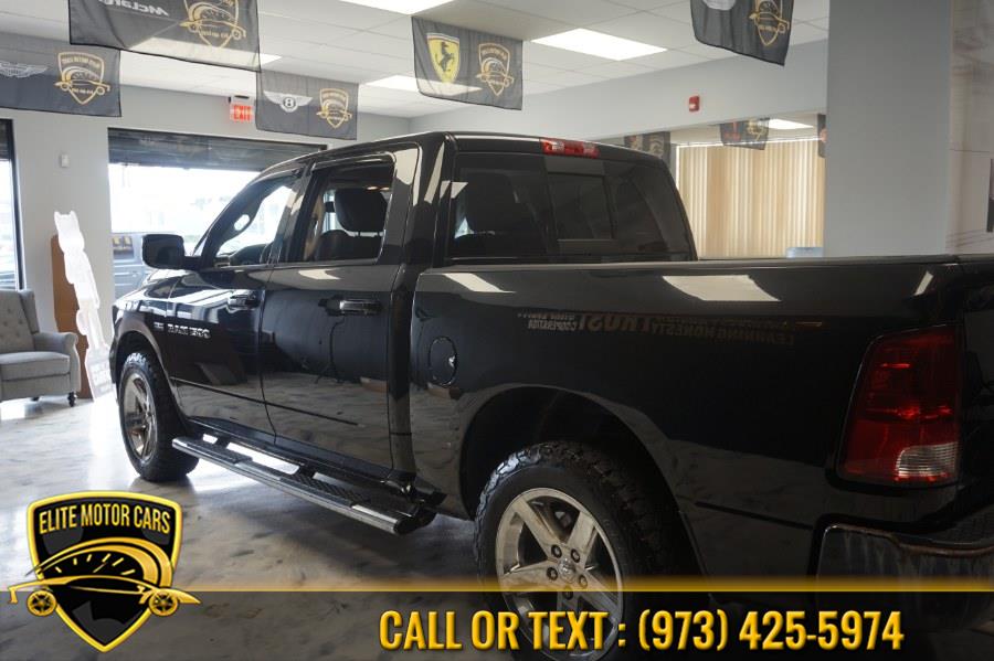 2012 Ram 1500 4WD Crew Cab 140.5" Sport, available for sale in Newark, New Jersey | Elite Motor Cars. Newark, New Jersey 2012 Ram 1500 4WD Crew Cab 140.5" Sport, available for sale in Newark, New Jersey | Elite Motor Cars. Newark, New Jersey