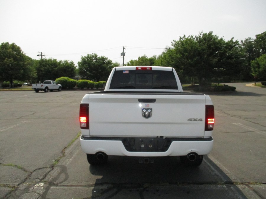 2013 Ram 1500 4WD Quad Cab 140.5" Sport, available for sale in New Britain, Connecticut | Universal Motors LLC. New Britain, Connecticut 2013 Ram 1500 4WD Quad Cab 140.5" Sport, available for sale in New Britain, Connecticut | Universal Motors LLC. New Britain, Connecticut