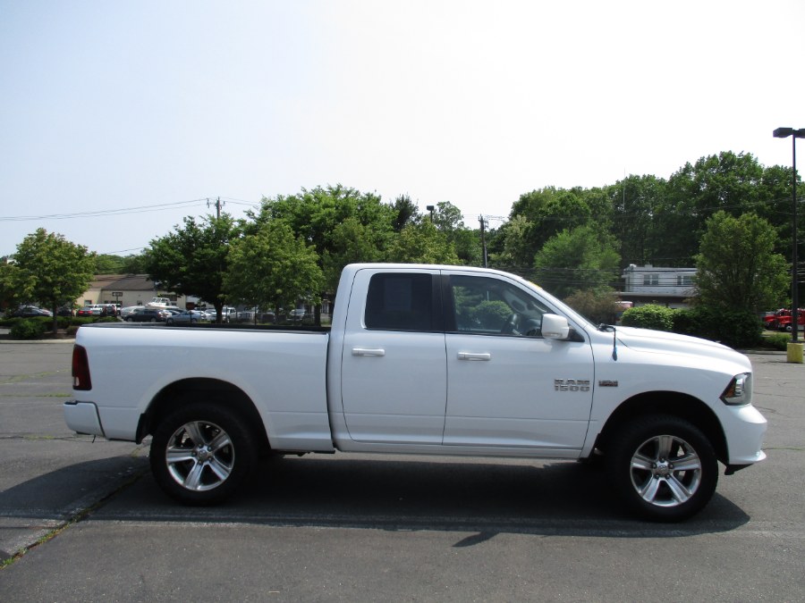 2013 Ram 1500 4WD Quad Cab 140.5" Sport, available for sale in New Britain, Connecticut | Universal Motors LLC. New Britain, Connecticut 2013 Ram 1500 4WD Quad Cab 140.5" Sport, available for sale in New Britain, Connecticut | Universal Motors LLC. New Britain, Connecticut