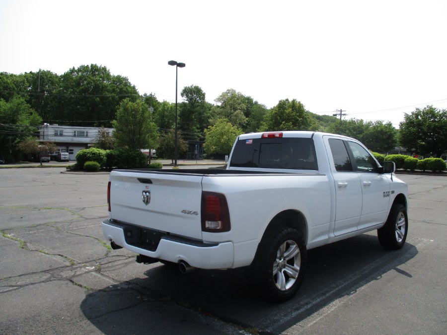 2013 Ram 1500 4WD Quad Cab 140.5" Sport, available for sale in New Britain, Connecticut | Universal Motors LLC. New Britain, Connecticut 2013 Ram 1500 4WD Quad Cab 140.5" Sport, available for sale in New Britain, Connecticut | Universal Motors LLC. New Britain, Connecticut
