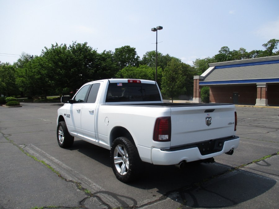 2013 Ram 1500 4WD Quad Cab 140.5" Sport, available for sale in New Britain, Connecticut | Universal Motors LLC. New Britain, Connecticut 2013 Ram 1500 4WD Quad Cab 140.5" Sport, available for sale in New Britain, Connecticut | Universal Motors LLC. New Britain, Connecticut