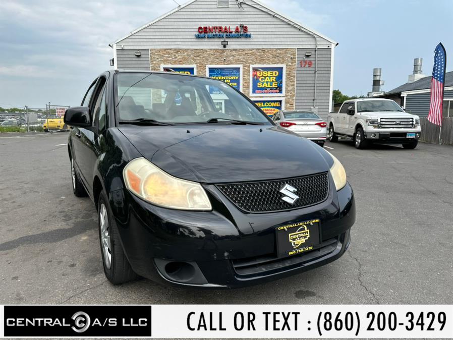2010 Suzuki SX4 4dr Sdn Man LE FWD, available for sale in East Windsor, Connecticut | Central A/S LLC. East Windsor, Connecticut 2010 Suzuki SX4 4dr Sdn Man LE FWD, available for sale in East Windsor, Connecticut | Central A/S LLC. East Windsor, Connecticut