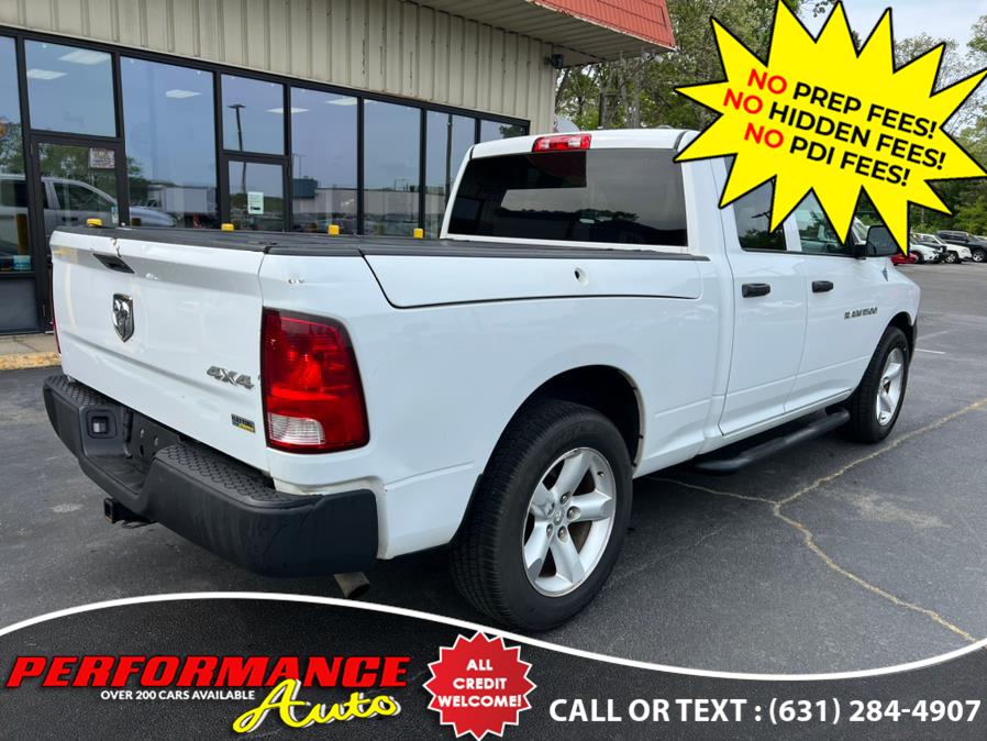2012 Ram 1500 4WD Quad Cab 140.5" Tradesman, available for sale in Bohemia, New York | Performance Auto Inc. Bohemia, New York 2012 Ram 1500 4WD Quad Cab 140.5" Tradesman, available for sale in Bohemia, New York | Performance Auto Inc. Bohemia, New York