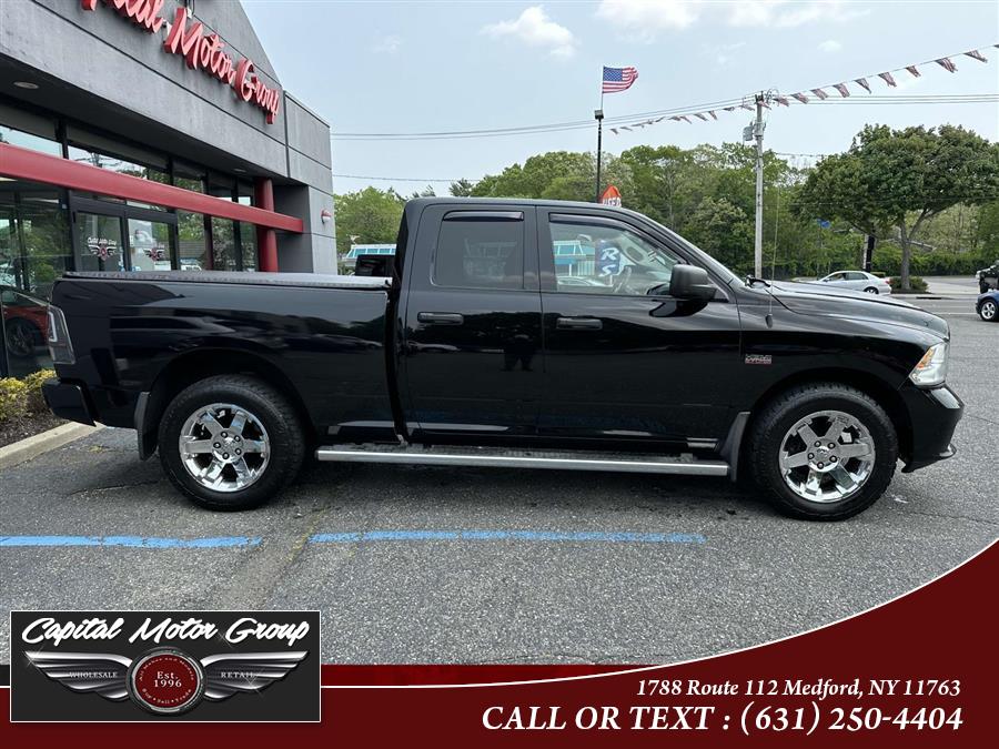 2014 Ram 1500 4WD Quad Cab 140.5" Express, available for sale in Medford, New York | Capital Motor Group Inc. Medford, New York 2014 Ram 1500 4WD Quad Cab 140.5" Express, available for sale in Medford, New York | Capital Motor Group Inc. Medford, New York
