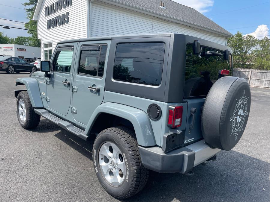 2014 Jeep Wrangler Unlimited 4WD 4dr Sahara, available for sale in Agawam, Massachusetts | Malkoon Motors. Agawam, Massachusetts 2014 Jeep Wrangler Unlimited 4WD 4dr Sahara, available for sale in Agawam, Massachusetts | Malkoon Motors. Agawam, Massachusetts