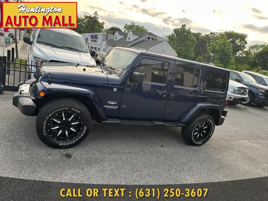 2013 Jeep Wrangler Unlimited 4WD 4dr Sahara, available for sale in Huntington Station, New York | Huntington Auto Mall. Huntington Station, New York 2013 Jeep Wrangler Unlimited 4WD 4dr Sahara, available for sale in Huntington Station, New York | Huntington Auto Mall. Huntington Station, New York