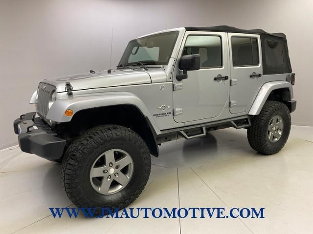 2013 Jeep Wrangler Unlimited Freedom Edition, available for sale in Naugatuck, Connecticut | J&M Automotive Sls&Svc LLC. Naugatuck, Connecticut