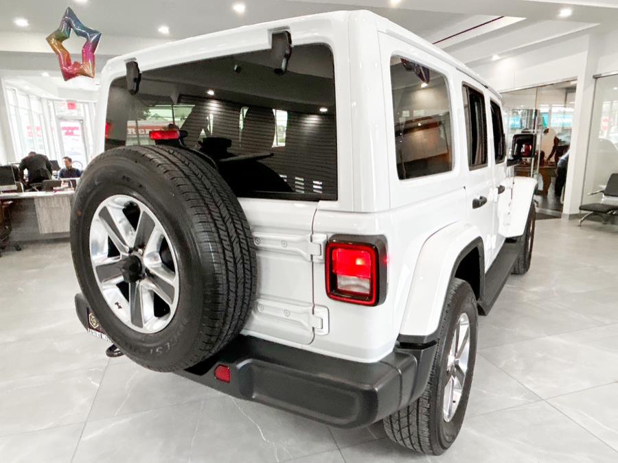 2021 Jeep Wrangler Unlimited Sahara Altitude 4x4, available for sale in Franklin Square, New York | Luxury Motor Club. Franklin Square, New York 2021 Jeep Wrangler Unlimited Sahara Altitude 4x4, available for sale in Franklin Square, New York | Luxury Motor Club. Franklin Square, New York