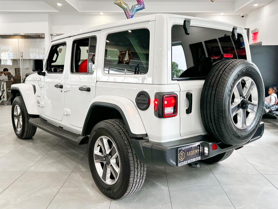 2021 Jeep Wrangler Unlimited Sahara Altitude 4x4, available for sale in Franklin Square, New York | Luxury Motor Club. Franklin Square, New York 2021 Jeep Wrangler Unlimited Sahara Altitude 4x4, available for sale in Franklin Square, New York | Luxury Motor Club. Franklin Square, New York