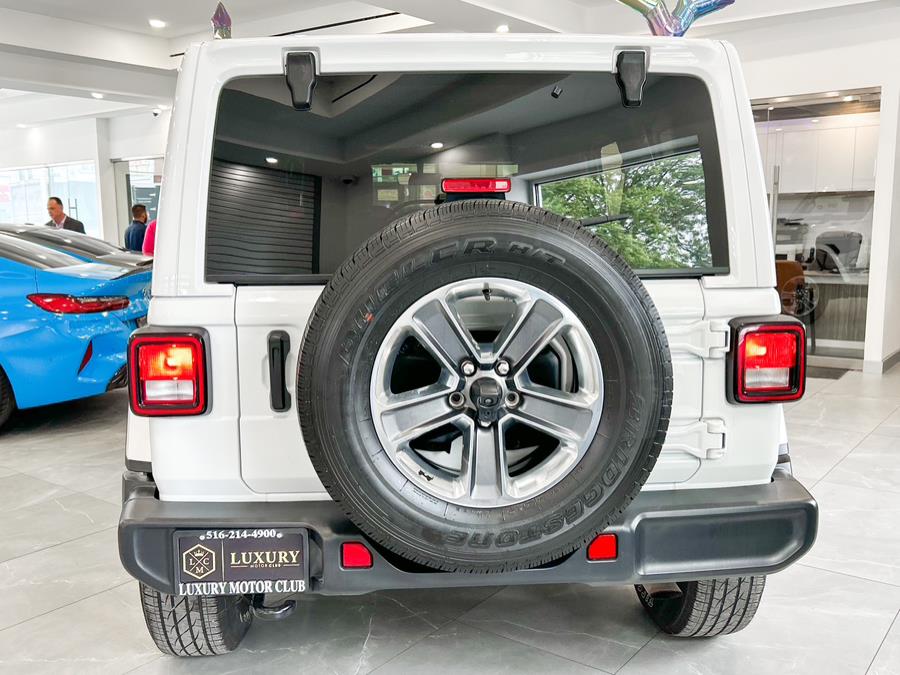 2021 Jeep Wrangler Unlimited Sahara Altitude 4x4, available for sale in Franklin Square, New York | Luxury Motor Club. Franklin Square, New York 2021 Jeep Wrangler Unlimited Sahara Altitude 4x4, available for sale in Franklin Square, New York | Luxury Motor Club. Franklin Square, New York