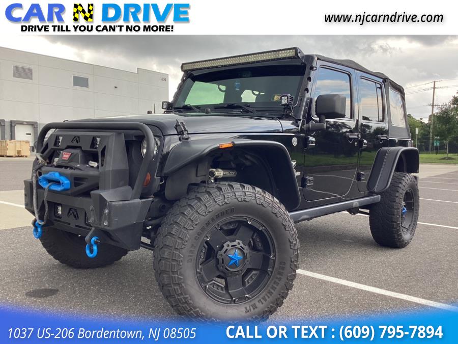 2013 Jeep Wrangler Unlimited Sport 4WD, available for sale in Burlington, New Jersey | Car N Drive. Burlington, New Jersey 2013 Jeep Wrangler Unlimited Sport 4WD, available for sale in Burlington, New Jersey | Car N Drive. Burlington, New Jersey