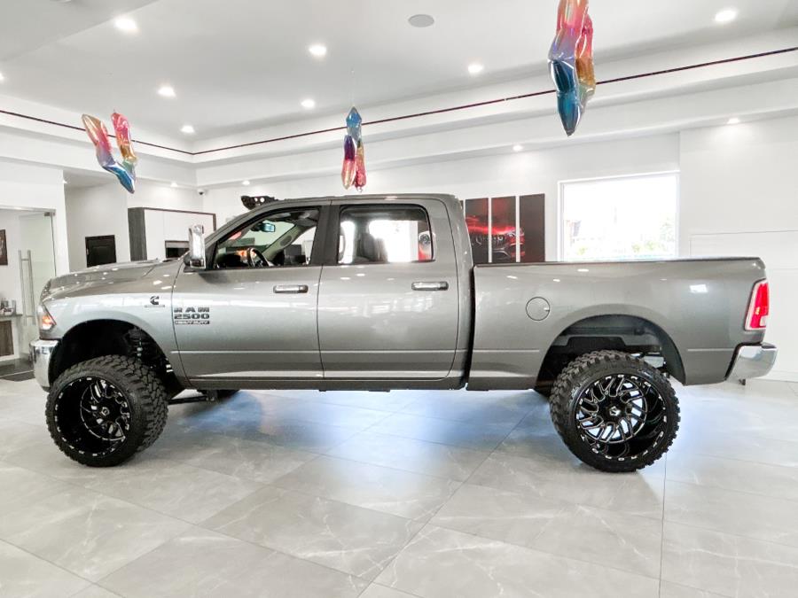 2013 Ram 2500 4WD Crew Cab 149" Laramie, available for sale in Franklin Square, New York | Luxury Motor Club. Franklin Square, New York 2013 Ram 2500 4WD Crew Cab 149" Laramie, available for sale in Franklin Square, New York | Luxury Motor Club. Franklin Square, New York