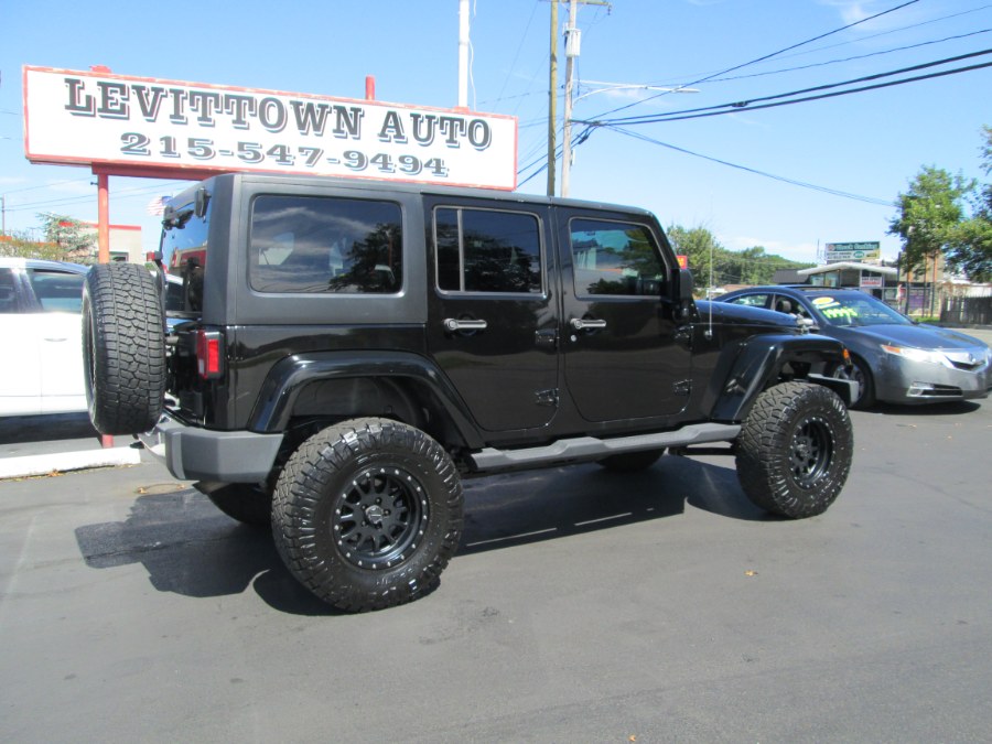 2012 Jeep Wrangler Unlimited 4WD 4dr Sahara, available for sale in Levittown, Pennsylvania | Levittown Auto. Levittown, Pennsylvania 2012 Jeep Wrangler Unlimited 4WD 4dr Sahara, available for sale in Levittown, Pennsylvania | Levittown Auto. Levittown, Pennsylvania