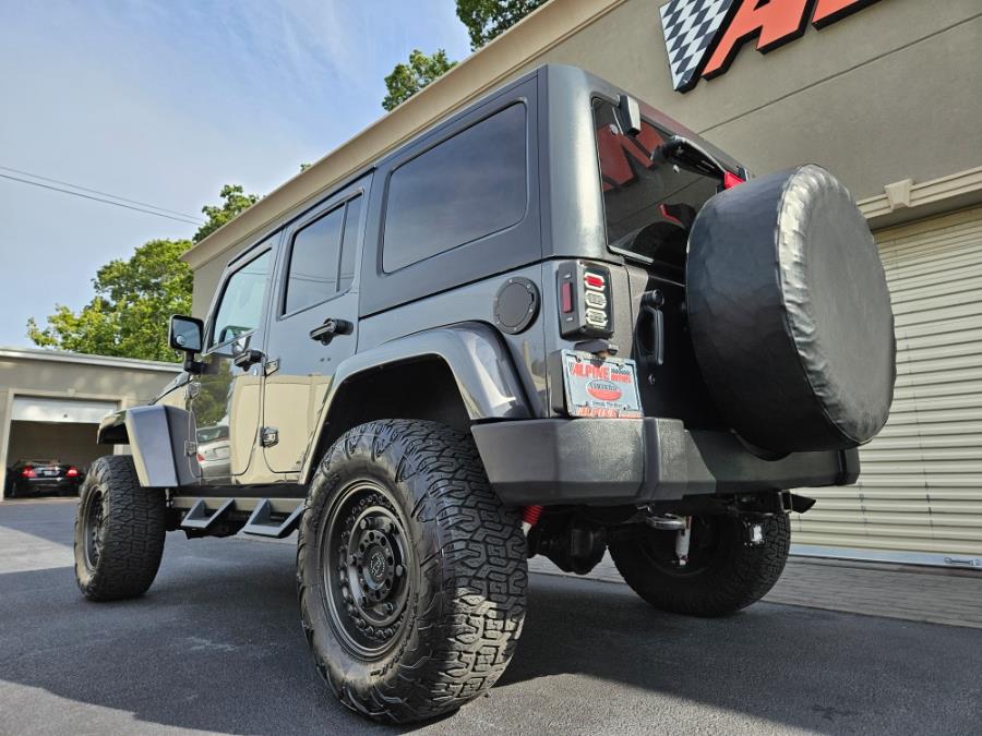 2014 Jeep Wrangler Unlimited 4WD 4dr Sahara, available for sale in Wantagh, New York | Alpine Motors Inc. Wantagh, New York 2014 Jeep Wrangler Unlimited 4WD 4dr Sahara, available for sale in Wantagh, New York | Alpine Motors Inc. Wantagh, New York