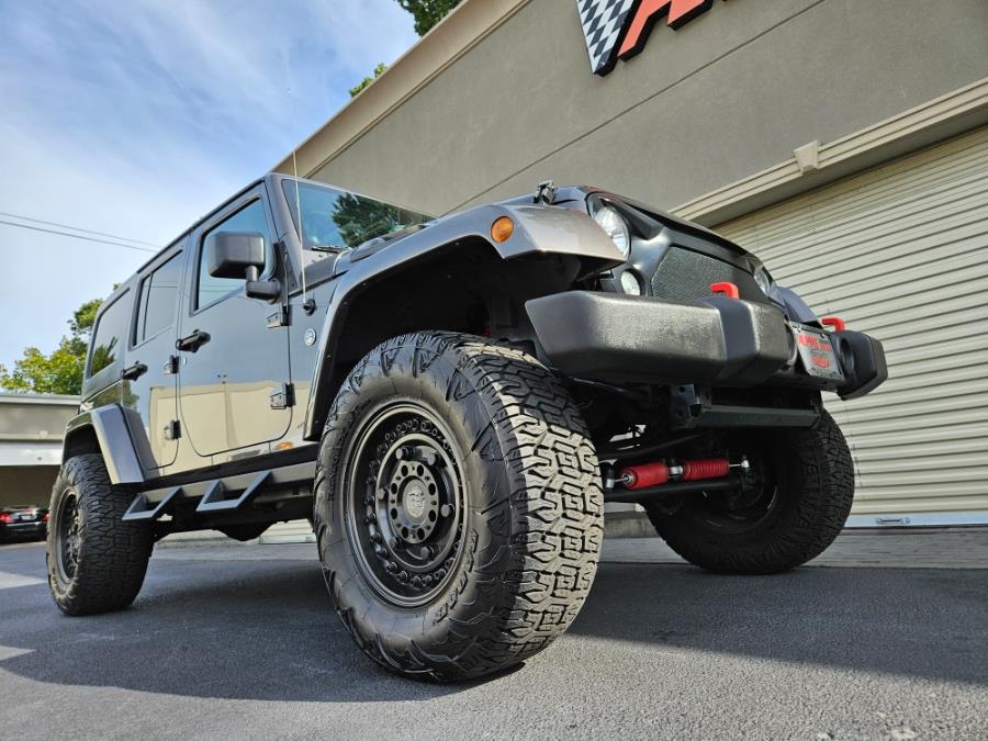 2014 Jeep Wrangler Unlimited 4WD 4dr Sahara, available for sale in Wantagh, New York | Alpine Motors Inc. Wantagh, New York 2014 Jeep Wrangler Unlimited 4WD 4dr Sahara, available for sale in Wantagh, New York | Alpine Motors Inc. Wantagh, New York