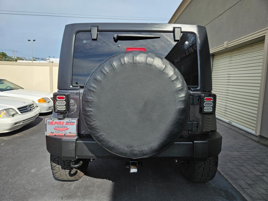 2014 Jeep Wrangler Unlimited 4WD 4dr Sahara, available for sale in Wantagh, New York | Alpine Motors Inc. Wantagh, New York 2014 Jeep Wrangler Unlimited 4WD 4dr Sahara, available for sale in Wantagh, New York | Alpine Motors Inc. Wantagh, New York