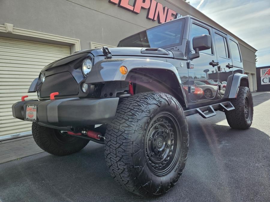 2014 Jeep Wrangler Unlimited 4WD 4dr Sahara, available for sale in Wantagh, New York | Alpine Motors Inc. Wantagh, New York 2014 Jeep Wrangler Unlimited 4WD 4dr Sahara, available for sale in Wantagh, New York | Alpine Motors Inc. Wantagh, New York