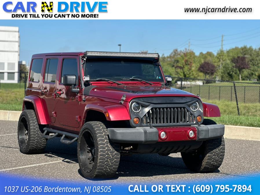 2012 Jeep Wrangler Unlimited Sahara 4WD, available for sale in Burlington, New Jersey | Car N Drive. Burlington, New Jersey 2012 Jeep Wrangler Unlimited Sahara 4WD, available for sale in Burlington, New Jersey | Car N Drive. Burlington, New Jersey