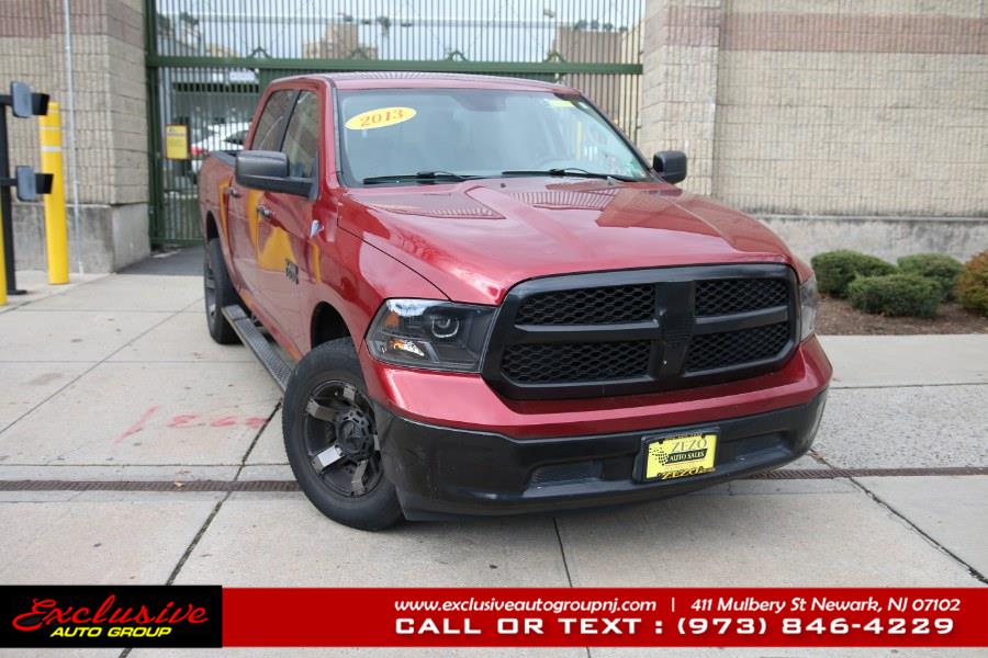 2013 Ram 1500 4WD Crew Cab 140.5" SLT, available for sale in Newark, New Jersey | Exclusive Auto Group. Newark, New Jersey