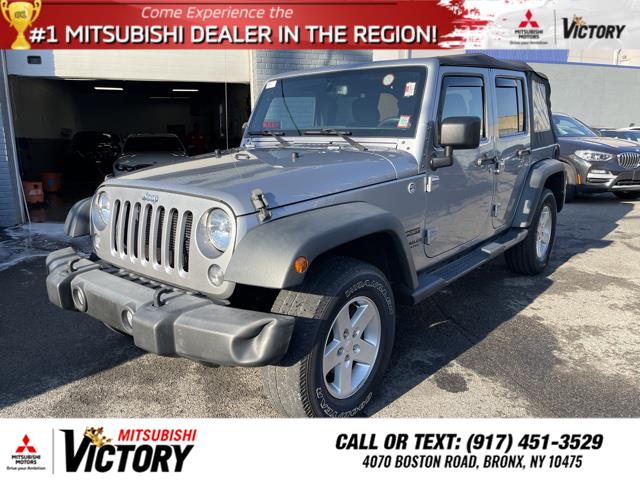 2015 Jeep Wrangler Unlimited Sport, available for sale in Bronx, New York | Victory Mitsubishi and Pre-Owned Super Center. Bronx, New York