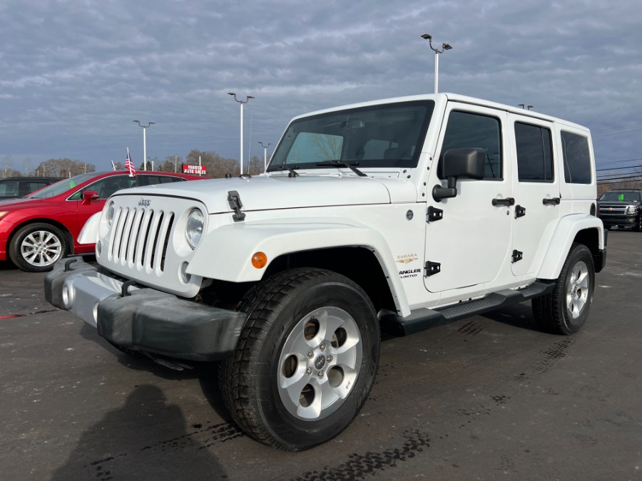 2015 Jeep Wrangler Unlimited 4WD 4dr Sahara, available for sale in Ortonville, Michigan | Marsh Auto Sales LLC. Ortonville, Michigan