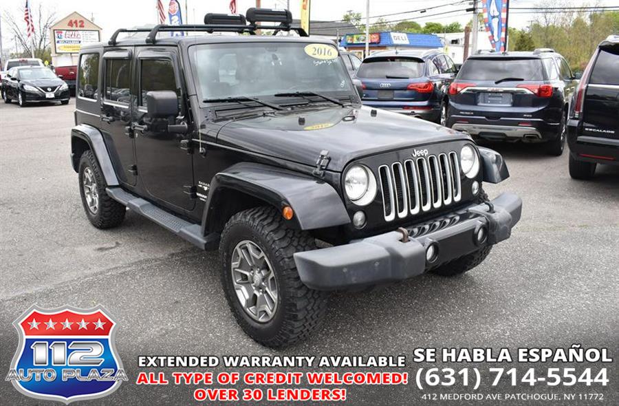 2016 Jeep Wrangler Unlimi SAHARA, available for sale in Patchogue, New York | 112 Auto Plaza. Patchogue, New York