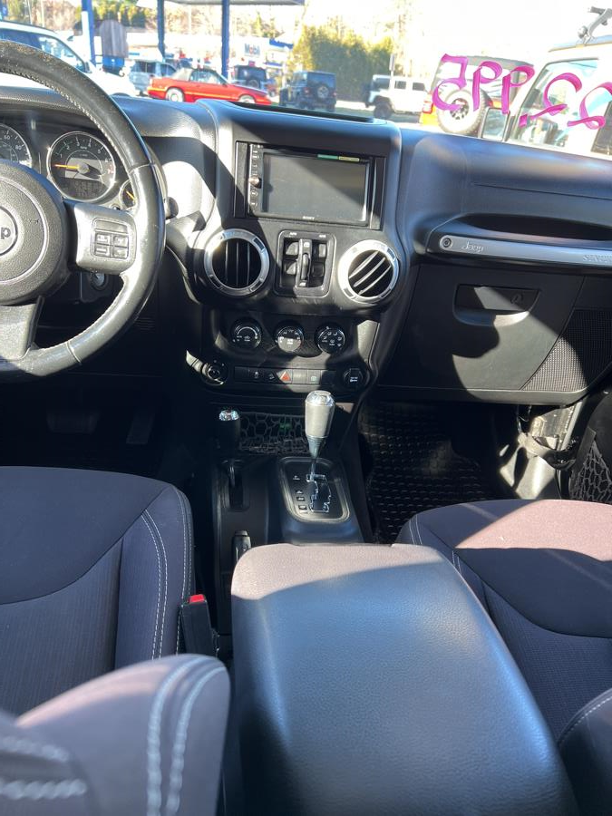 2014 Jeep Wrangler Unlimited 4WD 4dr Sahara, available for sale in Branford, Connecticut | Al Mac Motors 2. Branford, Connecticut 2014 Jeep Wrangler Unlimited 4WD 4dr Sahara, available for sale in Branford, Connecticut | Al Mac Motors 2. Branford, Connecticut