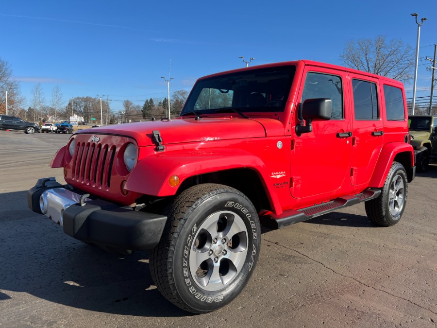 2013 Jeep Wrangler Unlimited 4WD 4dr Sahara, available for sale in Ortonville, Michigan | Marsh Auto Sales LLC. Ortonville, Michigan