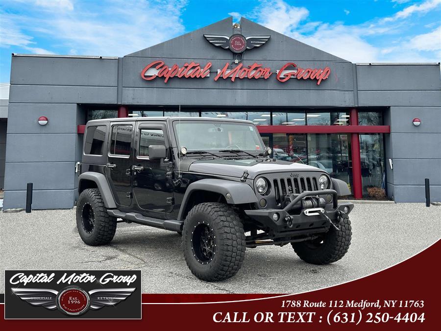 2014 Jeep Wrangler Unlimited 4WD 4dr Sport, available for sale in Medford, New York | Capital Motor Group Inc. Medford, New York