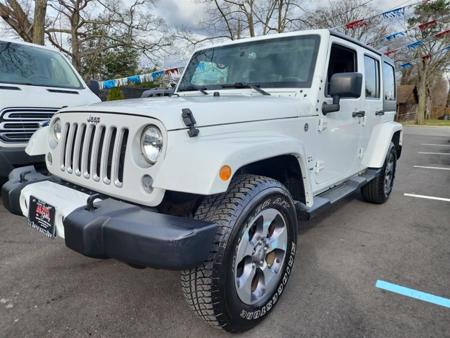 2016 Jeep Wrangler Unlimited 4WD 4dr Sahara, available for sale in Islip, New York | L.I. Auto Gallery. Islip, New York